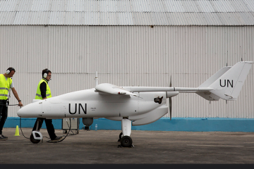 A UN Unmanned/Unarmed Aerial Vehicles (UAV) is taxiing in at Goma airport following a successful flight during an official ceremony with USG for UN Peacekeeping Operations Herve Ladsous, 3 December 2013. © MONUSCO/Sylvain Liechti