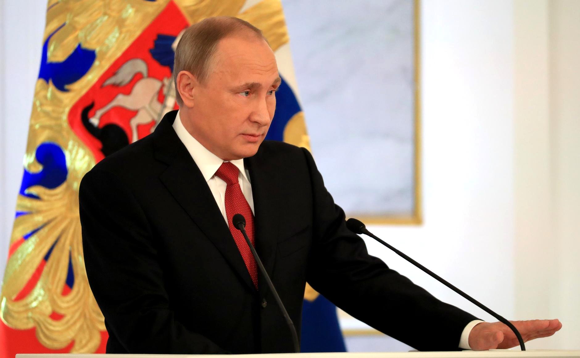 Putin at the podium describing the terms of his constitutional authority to use nuclear weapons.