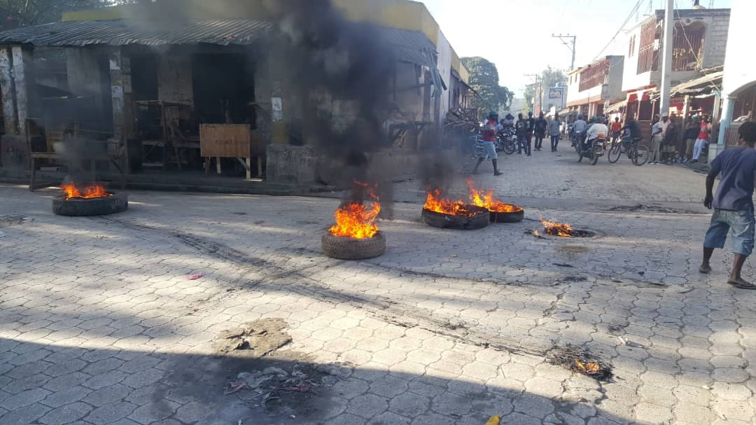 Flaming tires, burning buildings, chaos. Haiti’s struggle against powerful gang attacks on weak government institutions.